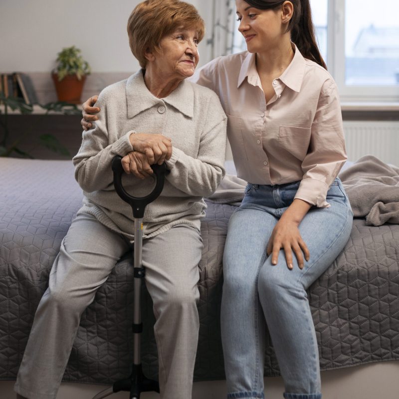 female-nurse-taking-care-elderly-person