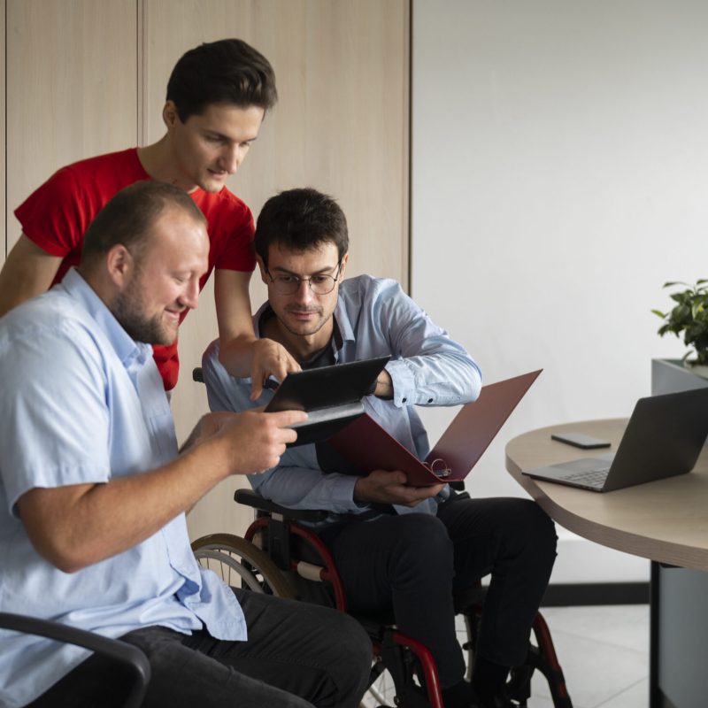 man-wheelchair-working-front-view